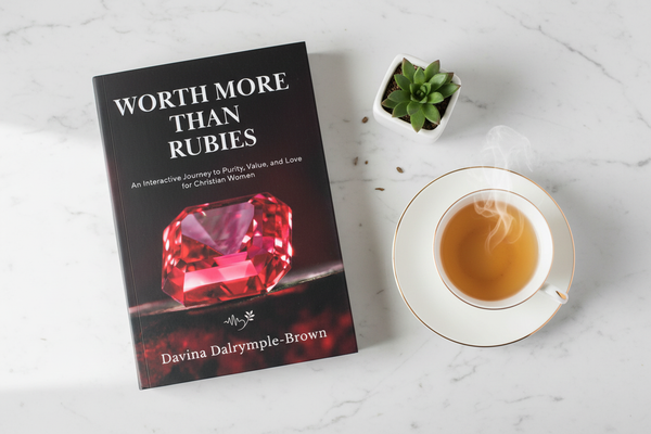 Worth More Than Rubies book lifestyle flat lay on marble surface